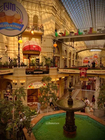 Ornate shopping arcade with hanging decorations