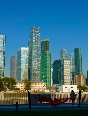 Waterfront promenade facing modern skyscrapers