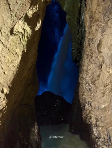Waterfall inside a narrow rocky gorge