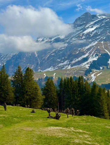 Small group on a grassy mountain slope