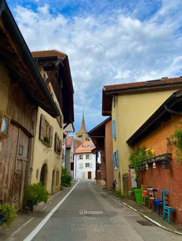 Narrow street between traditional village houses